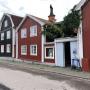 Oude houten huisjes in het oude gedeelte van de stad bij het Gamla torget